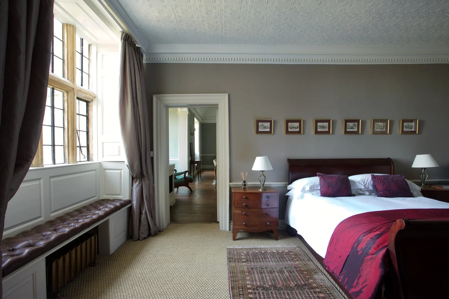 An elegant retreat bedroom with period features and soft natural light